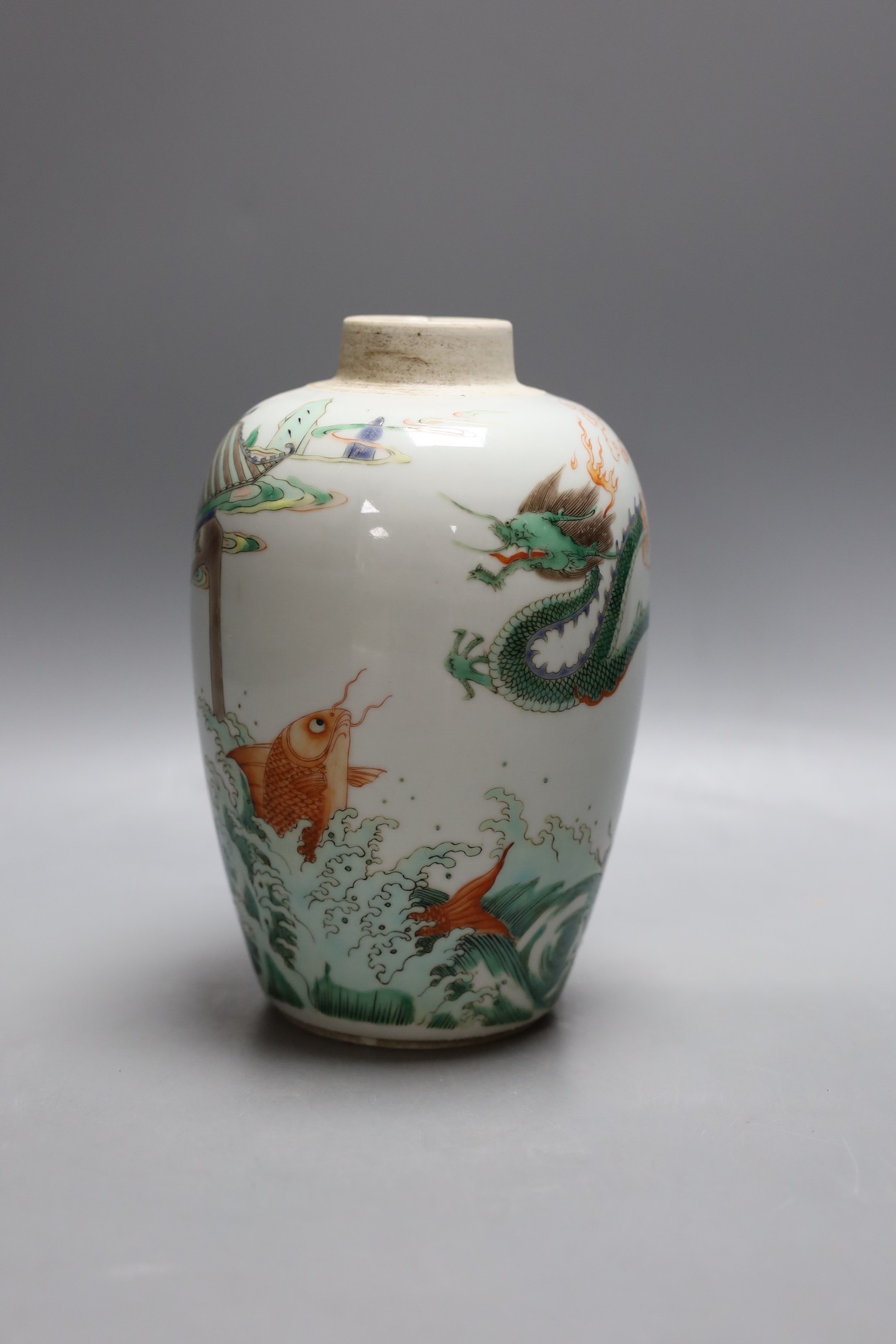 A Chinese famille verte ‘fish and dragon’ jar, lacking cover, 19cm